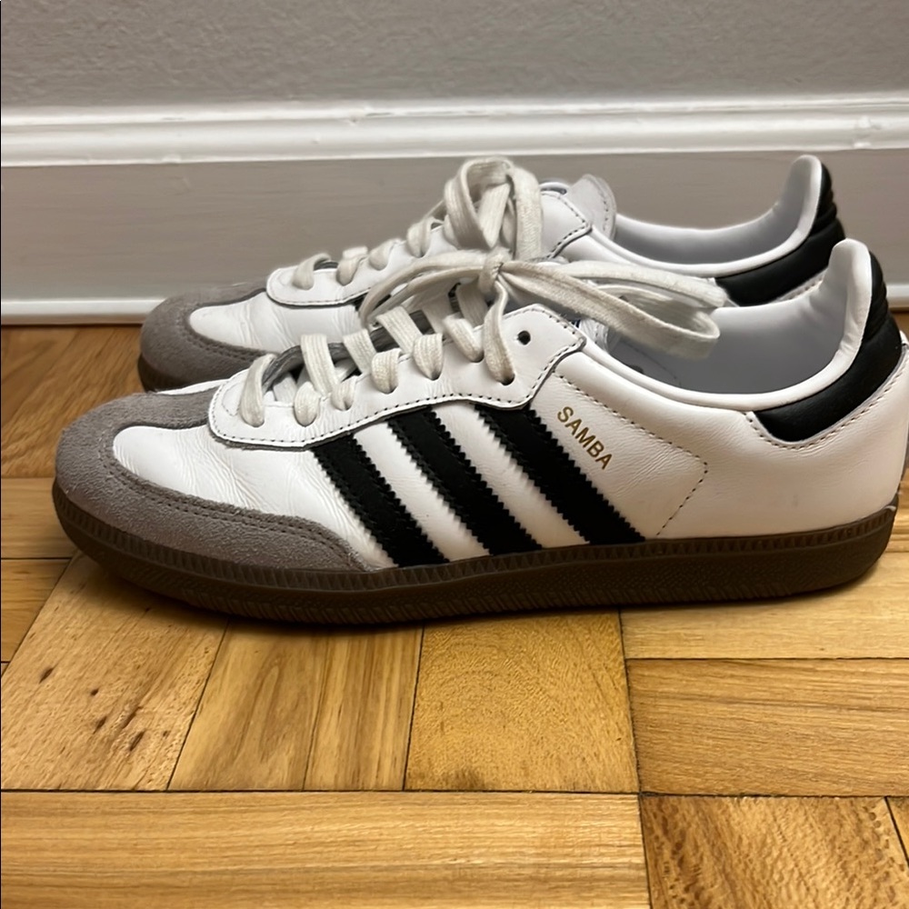 Adidas White and Black Sneakers with Iconic Stripes